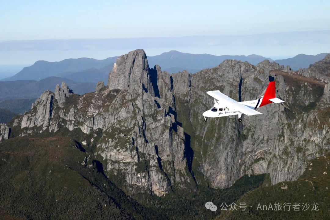 Small aircraft near Tasmanian mountains